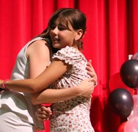 people at fifth grade moving up ceremony