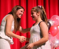 people at fifth grade moving up ceremony