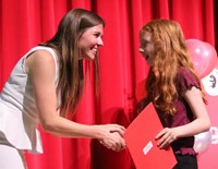 people at fifth grade moving up ceremony