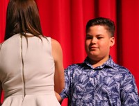 people at fifth grade moving up ceremony