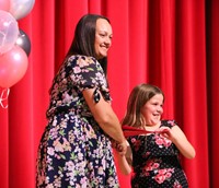 people at fifth grade moving up ceremony