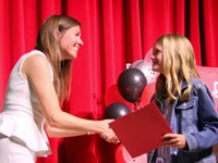 people at fifth grade moving up ceremony