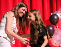 people at fifth grade moving up ceremony