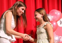 people at fifth grade moving up ceremony