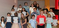 people at fifth grade moving up ceremony