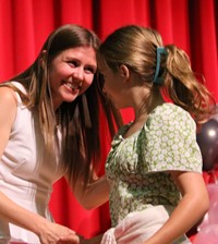 people at fifth grade moving up ceremony