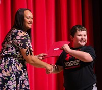 people at fifth grade moving up ceremony